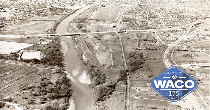 Aerial view of the Brazos River and Waco in 1964
