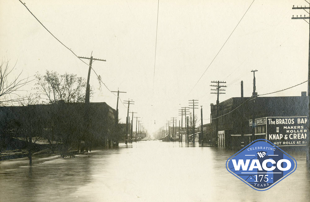 Sepia photo. Flooded commercial street.