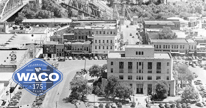 Black and white photo of Waco's town square City Hall in the center