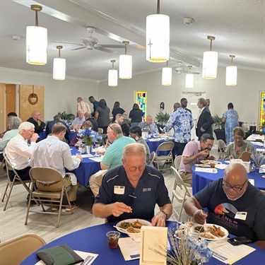 Guests enjoying lunch and visiting