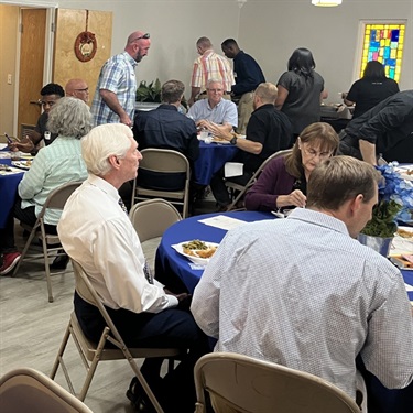 Guests enjoying lunch and visiting