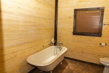 Bathroom 1 with a clawfoot bathtub