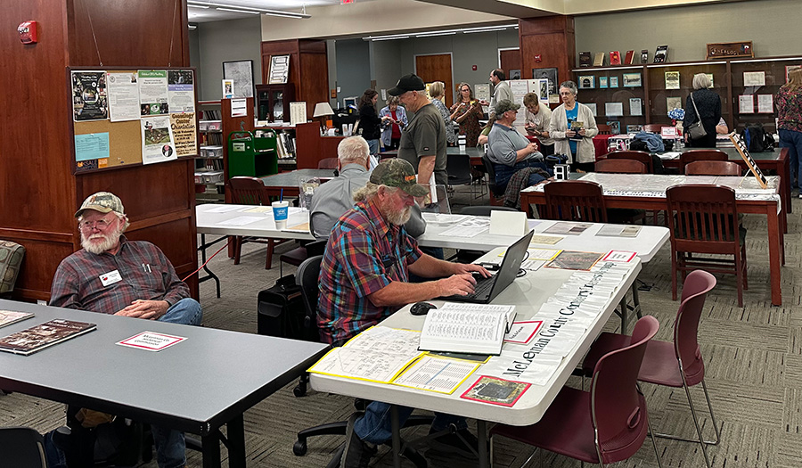 Adults researching family at the Genealogy Center